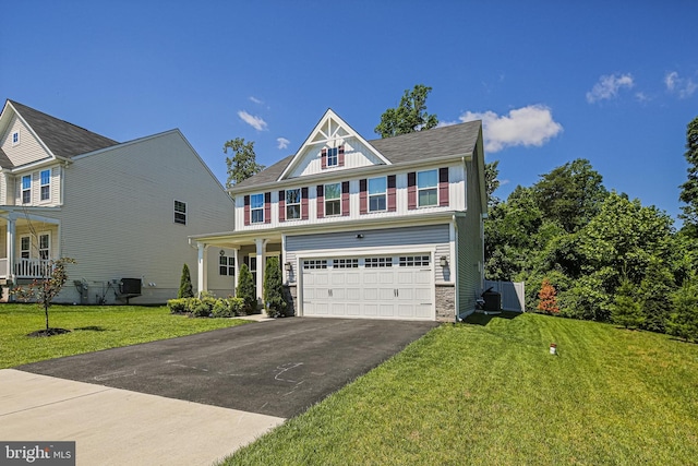 6023 Charles Henry Pl, Hanover, MD 21076 - view of front of property featuring driveway, a garage, and a front lawn