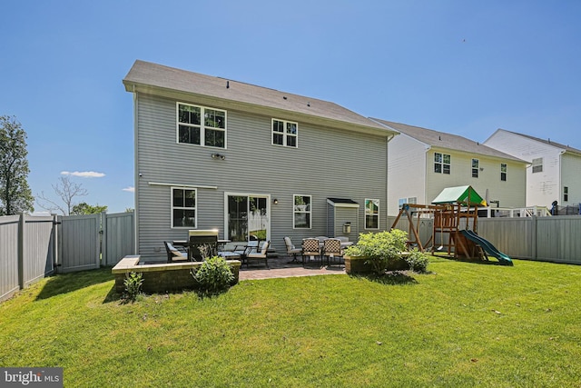 6023 Charles Henry Pl, Hanover, MD 21076 - back of property with a patio area and a playground