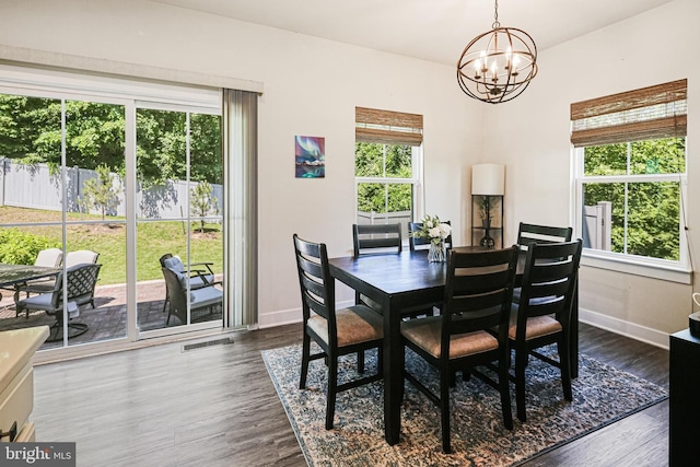 6023 Charles Henry Pl, Hanover, MD 21076 - dining space featuring a chandelier, plenty of natural light, and dark wood finished floors