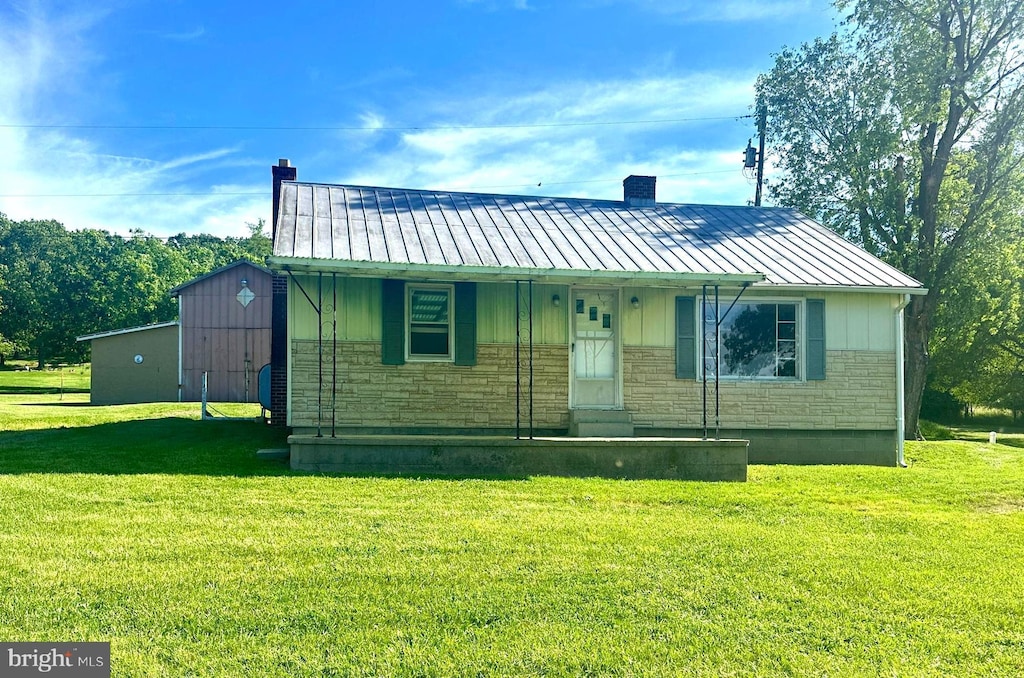 2232 State Road 55, Moorefield, WV 26836 - view of front of property featuring a chimney, stone siding, and a front lawn