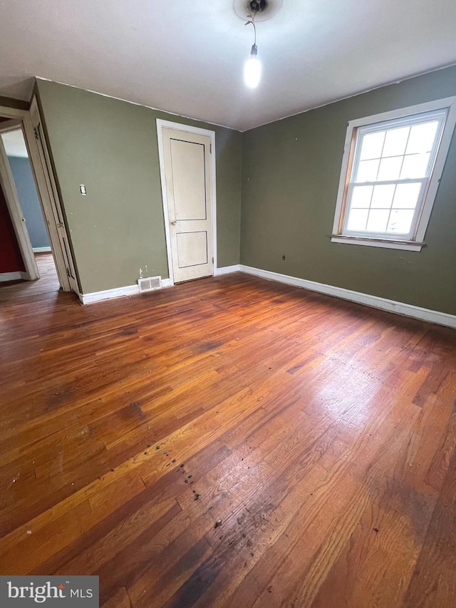 325 Jencohallo Ave, Hamilton, NJ 08619 - spare room with dark wood-style flooring and baseboards