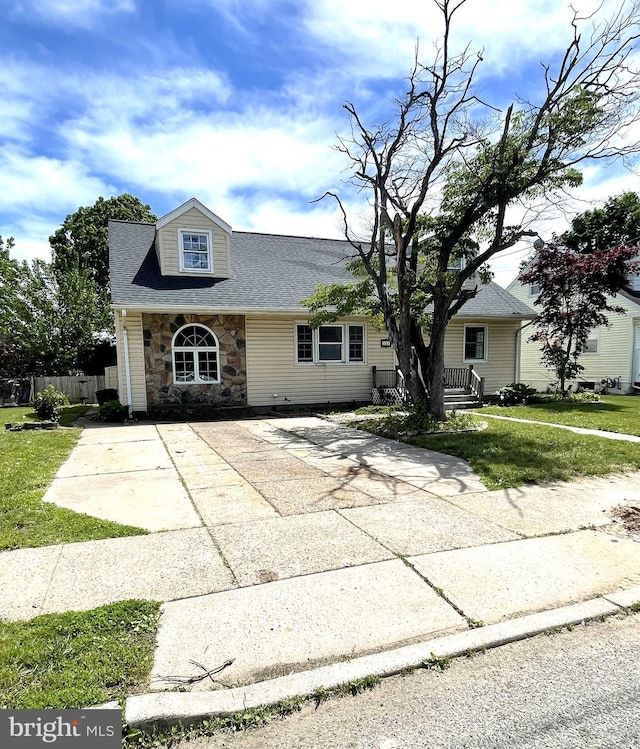 325 Jencohallo Ave, Hamilton, NJ 08619 - view of front of property featuring a porch, driveway, a shingled roof, and stone siding