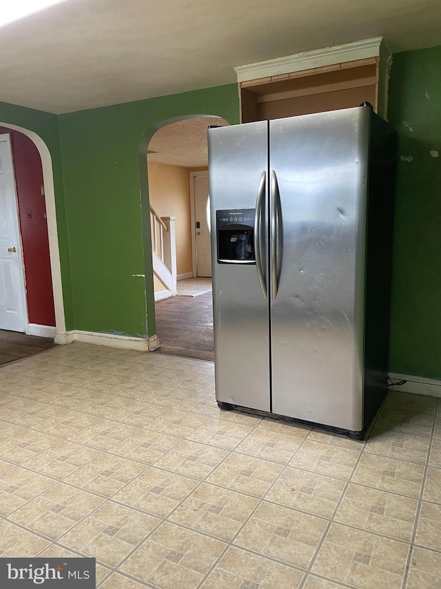 325 Jencohallo Ave, Hamilton, NJ 08619 - kitchen with stainless steel fridge with ice dispenser, arched walkways, and baseboards