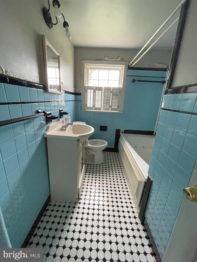 325 Jencohallo Ave, Hamilton, NJ 08619 - full bath featuring tile walls, vanity, toilet, tile patterned flooring, and wainscoting