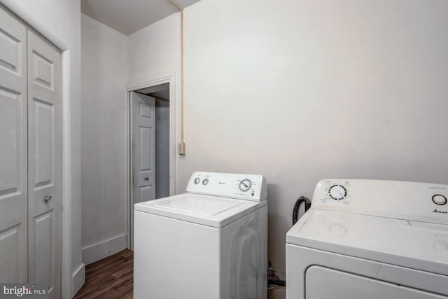 346 Main St, Denver, PA 17517 - laundry area with separate washer and dryer and dark wood-type flooring