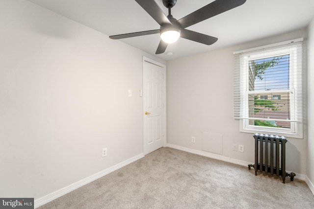 41 Bellevue Ter, Collingswood, NJ 08108 - carpeted empty room with radiator heating unit and a ceiling fan
