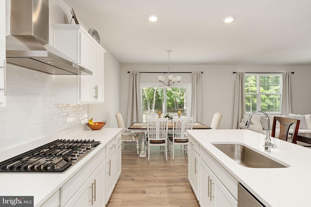 610 Long Meadow Dr, Fredericksburg, VA 22406 - kitchen with wall chimney range hood, a sink, appliances with stainless steel finishes, healthy amount of natural light, and recessed lighting