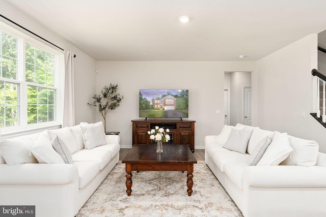 610 Long Meadow Dr, Fredericksburg, VA 22406 - living room with stairway, wood finished floors, baseboards, and recessed lighting