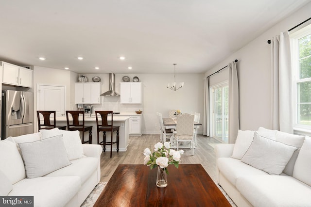 610 Long Meadow Dr, Fredericksburg, VA 22406 - living room featuring a chandelier, recessed lighting, and light wood-style flooring