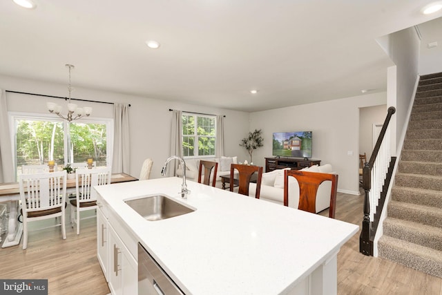 610 Long Meadow Dr, Fredericksburg, VA 22406 - kitchen with a sink, light countertops, light wood finished floors, white cabinetry, and recessed lighting