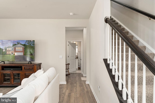 610 Long Meadow Dr, Fredericksburg, VA 22406 - living room with wood finished floors, baseboards, and stairs
