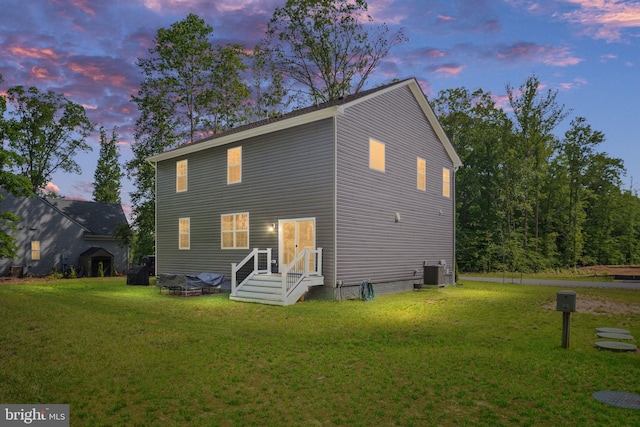 610 Long Meadow Dr, Fredericksburg, VA 22406 - rear view of house featuring a yard and central AC unit