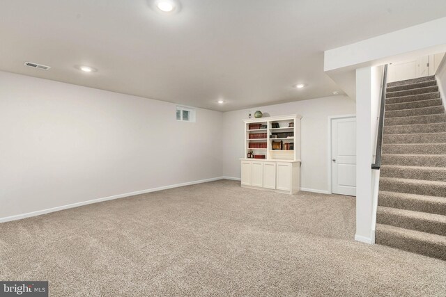 610 Long Meadow Dr, Fredericksburg, VA 22406 - finished basement with light colored carpet, recessed lighting, stairway, and baseboards
