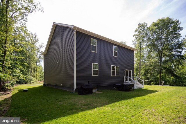 610 Long Meadow Dr, Fredericksburg, VA 22406 - rear view of house featuring a yard