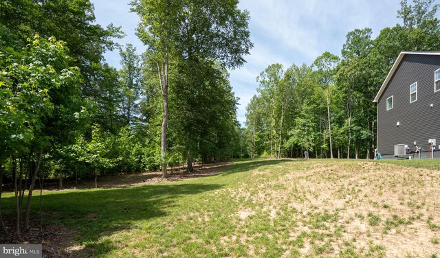610 Long Meadow Dr, Fredericksburg, VA 22406 - view of green lawn with central air condition unit