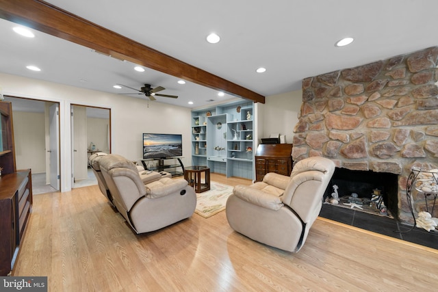 295 Chesapeake Ave, Prince Frederick, MD 20678 - living area with wood finished floors, beamed ceiling, ceiling fan, a fireplace, and recessed lighting