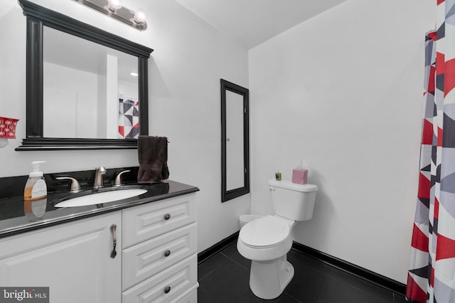295 Chesapeake Ave, Prince Frederick, MD 20678 - full bath with tile patterned flooring, toilet, vanity, and baseboards