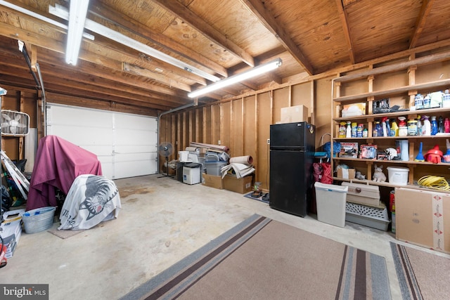 295 Chesapeake Ave, Prince Frederick, MD 20678 - garage featuring freestanding refrigerator