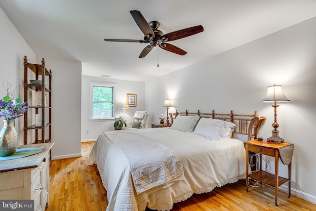 18919 Diary Rd, Montgomery Village, MD 20886 - bedroom featuring light wood finished floors, baseboards, and a ceiling fan