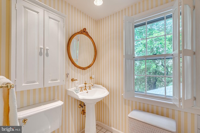 18919 Diary Rd, Montgomery Village, MD 20886 - half bathroom featuring wallpapered walls, toilet, tile patterned flooring, and baseboards