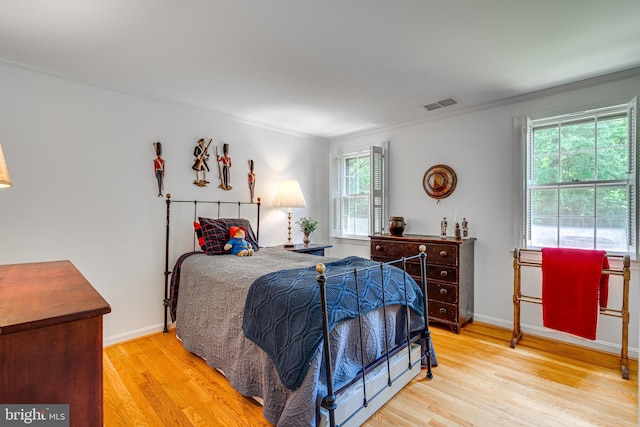 18919 Diary Rd, Montgomery Village, MD 20886 - bedroom featuring ornamental molding, wood finished floors, and baseboards