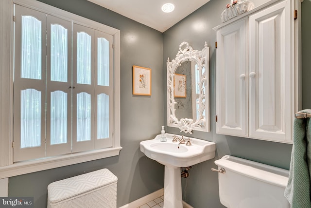 18919 Diary Rd, Montgomery Village, MD 20886 - half bathroom featuring toilet and baseboards