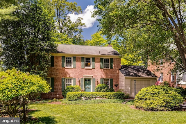 18919 Diary Rd, Montgomery Village, MD 20886 - colonial-style house featuring a garage, a front lawn, brick siding, and a chimney