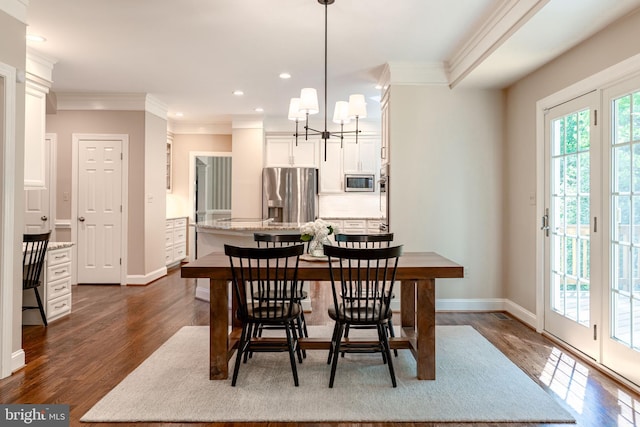 13016 Brookmead Dr, Manassas, VA 20112 - dining area with ornamental molding, dark wood finished floors, recessed lighting, a chandelier, and baseboards