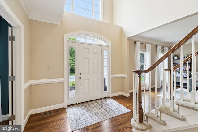13016 Brookmead Dr, Manassas, VA 20112 - foyer featuring wood finished floors, crown molding, and baseboards