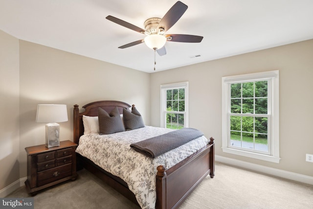 13016 Brookmead Dr, Manassas, VA 20112 - bedroom with baseboards, light colored carpet, and a ceiling fan