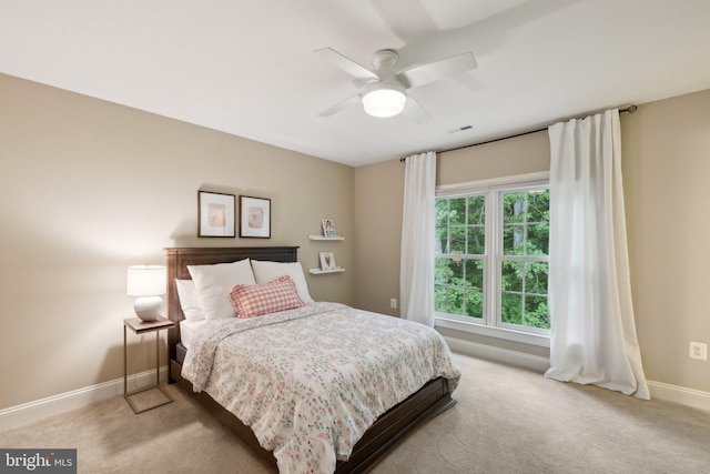13016 Brookmead Dr, Manassas, VA 20112 - bedroom featuring baseboards, light carpet, and ceiling fan