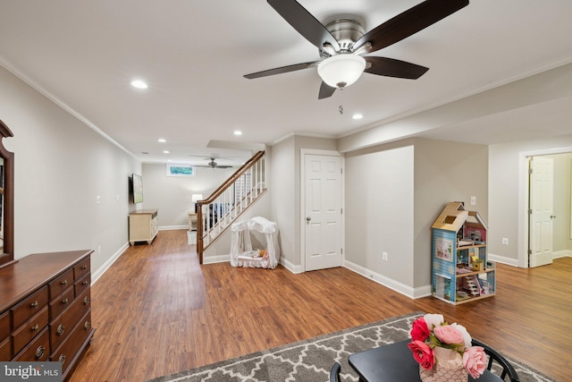 13016 Brookmead Dr, Manassas, VA 20112 - living area with a ceiling fan, stairway, crown molding, wood finished floors, and recessed lighting