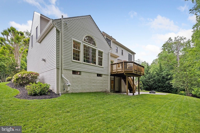 13016 Brookmead Dr, Manassas, VA 20112 - rear view of house with stairs, a deck, and a lawn