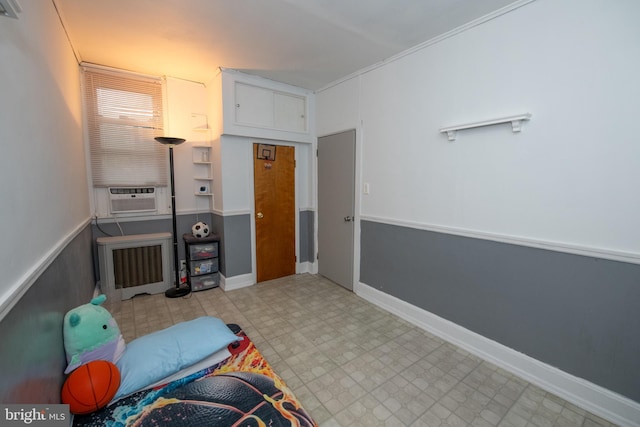 3444 G St, Philadelphia, PA 19134 - living area with radiator heating unit, tile patterned floors, cooling unit, and baseboards