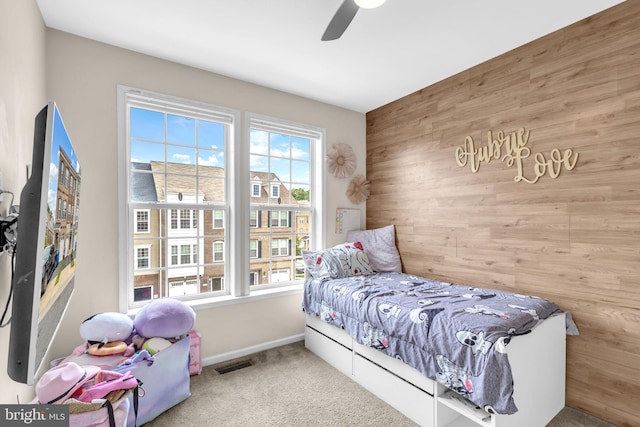 3536 Pipestone Pl, Waldorf, MD 20601 - bedroom featuring wooden walls, carpet, baseboards, and ceiling fan