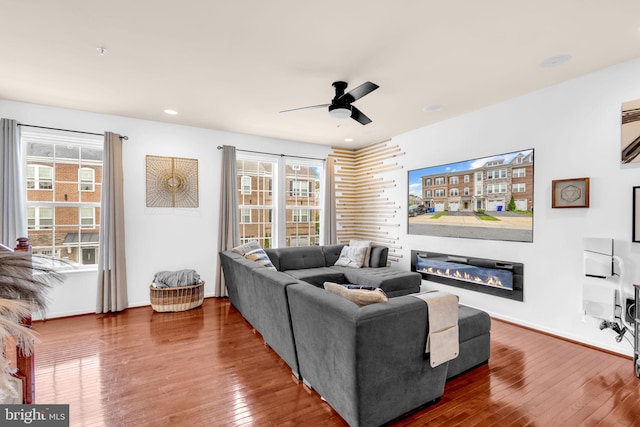 3536 Pipestone Pl, Waldorf, MD 20601 - living room featuring ceiling fan, wood-type flooring, a glass covered fireplace, baseboards, and recessed lighting