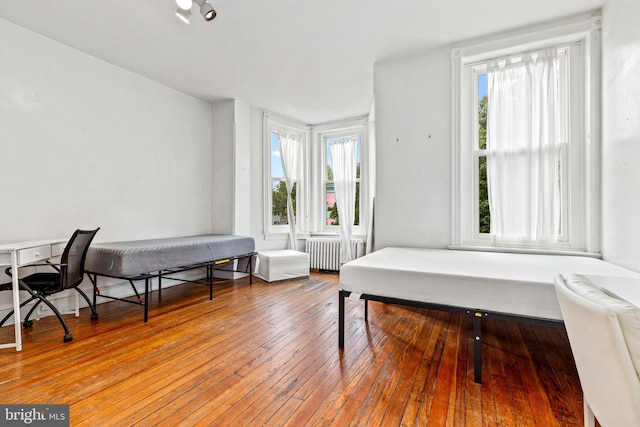 1328 35th St NW, Washington, DC 20007 - office space with radiator heating unit, plenty of natural light, and wood-type flooring