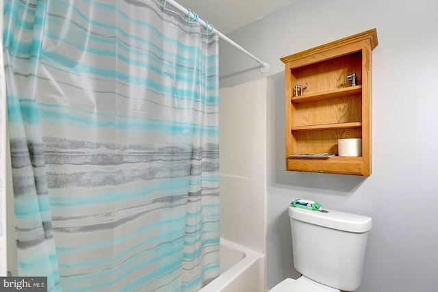 14298 S Union Church Rd, Ellendale, DE 19941 - bathroom with shower / tub combo with curtain and toilet