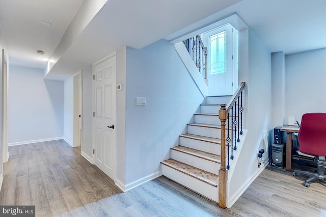 14298 S Union Church Rd, Ellendale, DE 19941 - stairway featuring wood finished floors and baseboards
