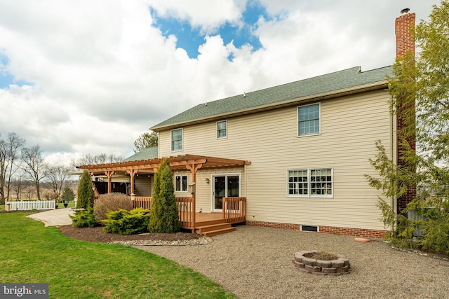 290 S Windy Mansion Rd, Denver, PA 17517 - rear view of house featuring a fire pit, a pergola, a wooden deck, a yard, and a chimney