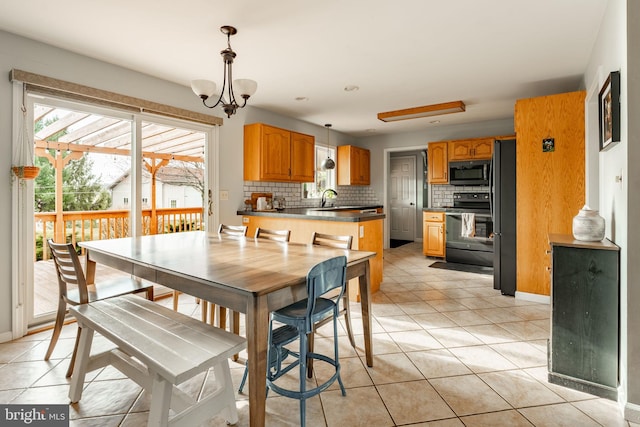 290 S Windy Mansion Rd, Denver, PA 17517 - dining area featuring light tile patterned flooring, baseboards, and a chandelier