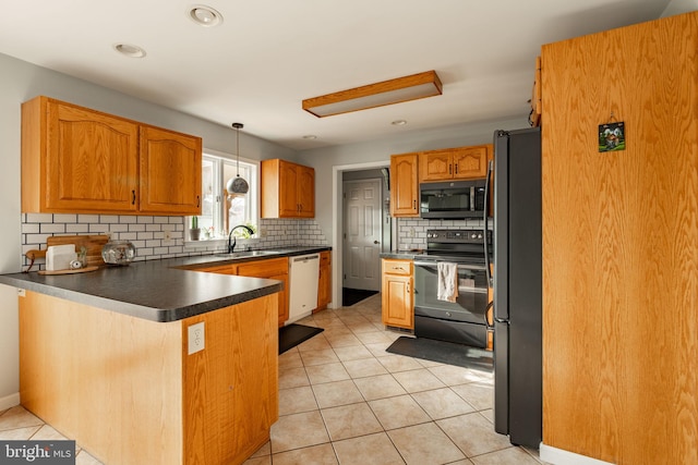 290 S Windy Mansion Rd, Denver, PA 17517 - kitchen featuring electric range, white dishwasher, a peninsula, a sink, and freestanding refrigerator