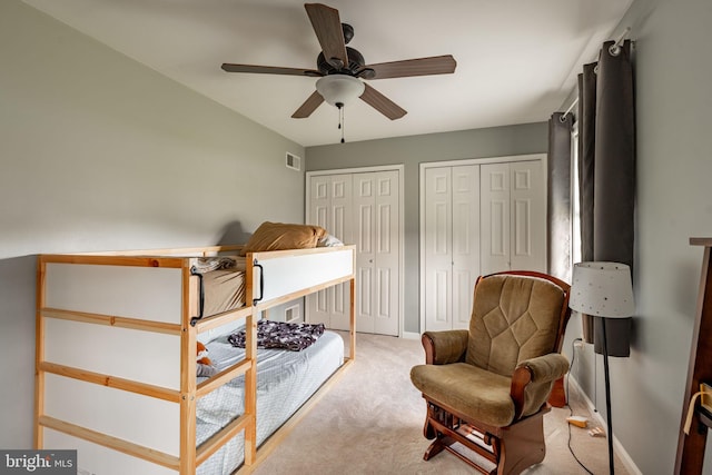 290 S Windy Mansion Rd, Denver, PA 17517 - bedroom featuring multiple closets, light colored carpet, baseboards, and ceiling fan