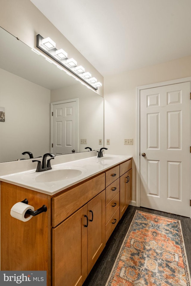 290 S Windy Mansion Rd, Denver, PA 17517 - bathroom with double vanity and wood finished floors