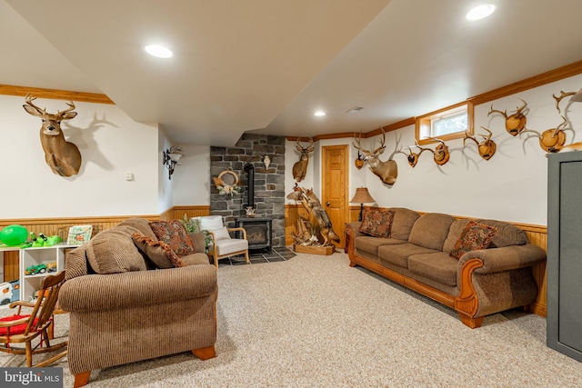 290 S Windy Mansion Rd, Denver, PA 17517 - carpeted living area featuring wainscoting, a wood stove, and recessed lighting