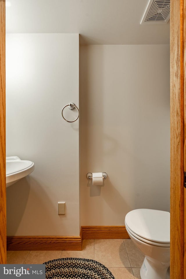 290 S Windy Mansion Rd, Denver, PA 17517 - bathroom featuring toilet, tile patterned flooring, and baseboards