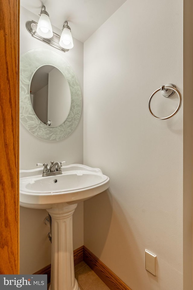 290 S Windy Mansion Rd, Denver, PA 17517 - bathroom featuring a sink, tile patterned floors, and baseboards