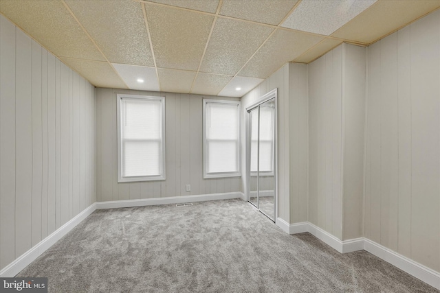 406 S Eaton St, Baltimore, MD 21224 - spare room with carpet and a drop ceiling