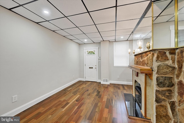 406 S Eaton St, Baltimore, MD 21224 - entryway featuring wood finished floors, baseboards, a glass covered fireplace, and recessed lighting