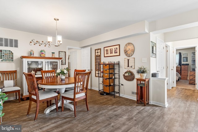 9 Peppergrass Dr N, Mount Laurel, NJ 08054 - dining room featuring wood finished floors, a chandelier, and baseboards